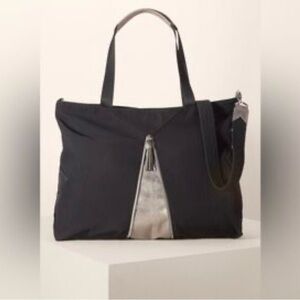 Stella & Dot "Work Hard Play Hard" Tote with a metallic pewter expandable zipper